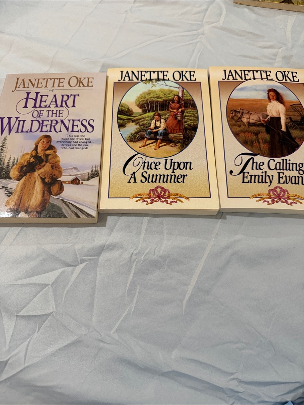 Janette Oke Paperback Book Set - Cream Covers with Purple Text